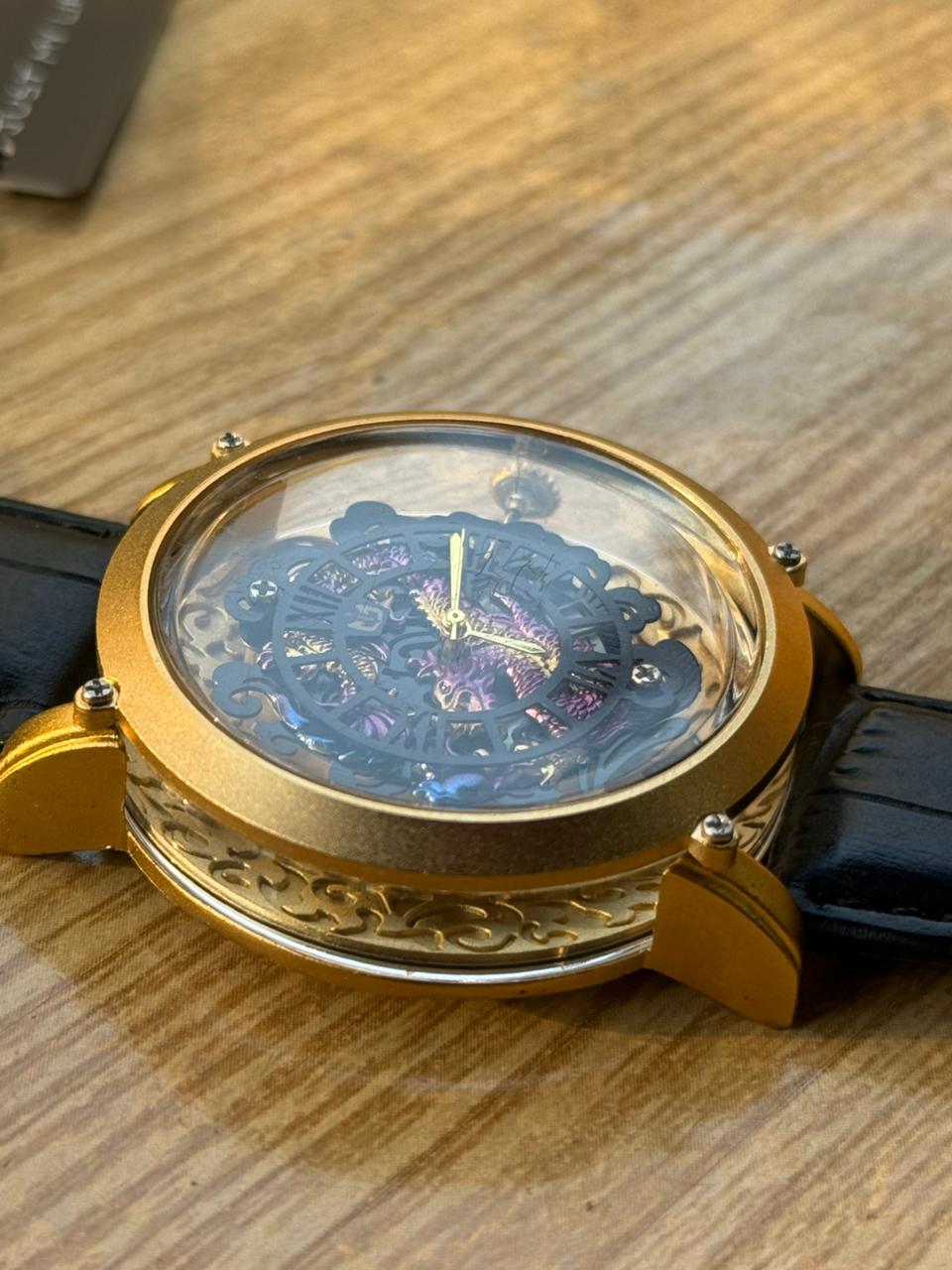 Dragon Engraved Transparent Dial Watch