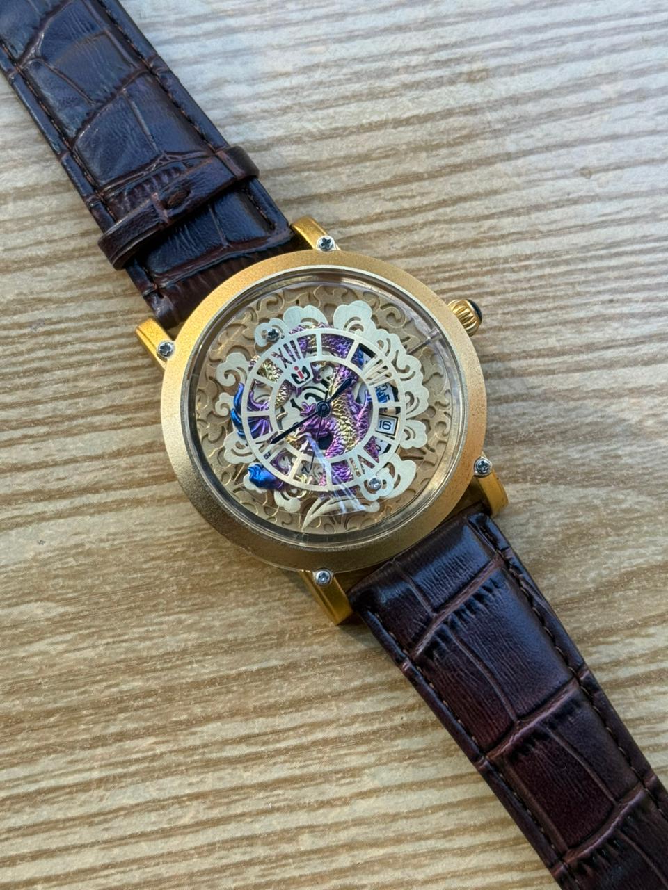 Dragon Engraved Transparent Dial Watch